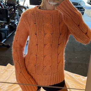 Orange knit sweater